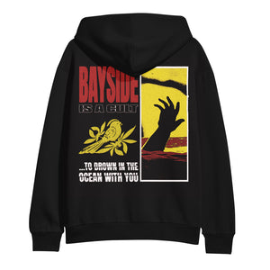 image of the back of a black pullover hoodie on a white background. hoodie has a full print of a hand coming out of water, bayside, a bird and the words to drown in the ocean with you.