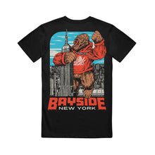 Load image into Gallery viewer, Black Bayside T-shirt featuring a large graphic of a gorilla in a red hoodie towering over the Empire State Building, with &quot;BAYSIDE NEW YORK&quot; in bold red and white text below.