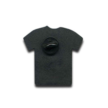 Load image into Gallery viewer, A black, T-shirt-shaped enamel pin by Bayside, inspired by the Errors Tour Pin, is shown from the back with a central butterfly clutch attachment, set against a white background.