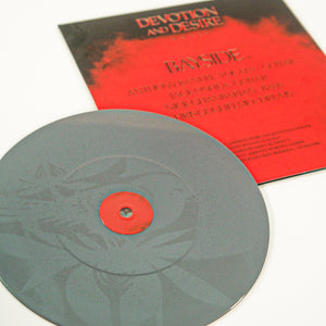 A gray vinyl record featuring subtle floral patterns sits beside a red and black Bayside Devotion and Desire 2025 limited pressing cover, listing band members and displaying a smoky design.