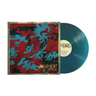 A teal vinyl record slides out of its square album cover, which features a red, blue, and black floral camouflage design with the Bayside name and a butterfly logo on the bottom left.