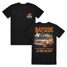 Load image into Gallery viewer, Black ring-spun cotton t-shirt with a Bayside bird logo on the front chest and a back graphic featuring skeletons in a van, the text Bayside Paranormal Services, and a phone number in a modern classic fit.