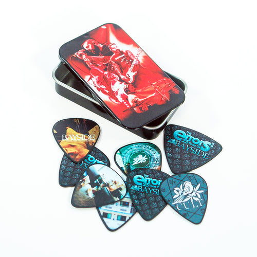 An open metal case with a red band image on the lid spills out several colorful illustrated guitar picks, each featuring band names such as Bayside, The Ghost Inside, and Senses Fail.