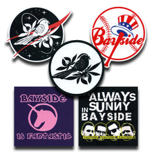 Load image into Gallery viewer, This Bayside Sticker Pack by Bayside includes six fun designs: birds with branches, Bayside with a hat, a unicorn saying &quot;Bayside is Fantastic,&quot; and &quot;Always Sunny in Bayside&quot; with men&#39;s faces and caution tape.