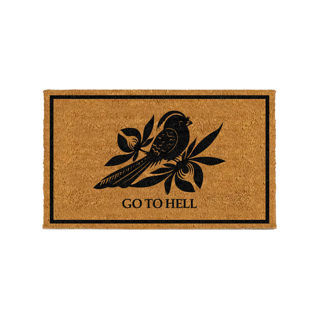 The Bayside rectangular brown Go To Hell welcome mat features a black bird on branches and leaves, bold GO TO HELL text below, and is the perfect funny doormat for anyone who loves a sarcastic welcome.