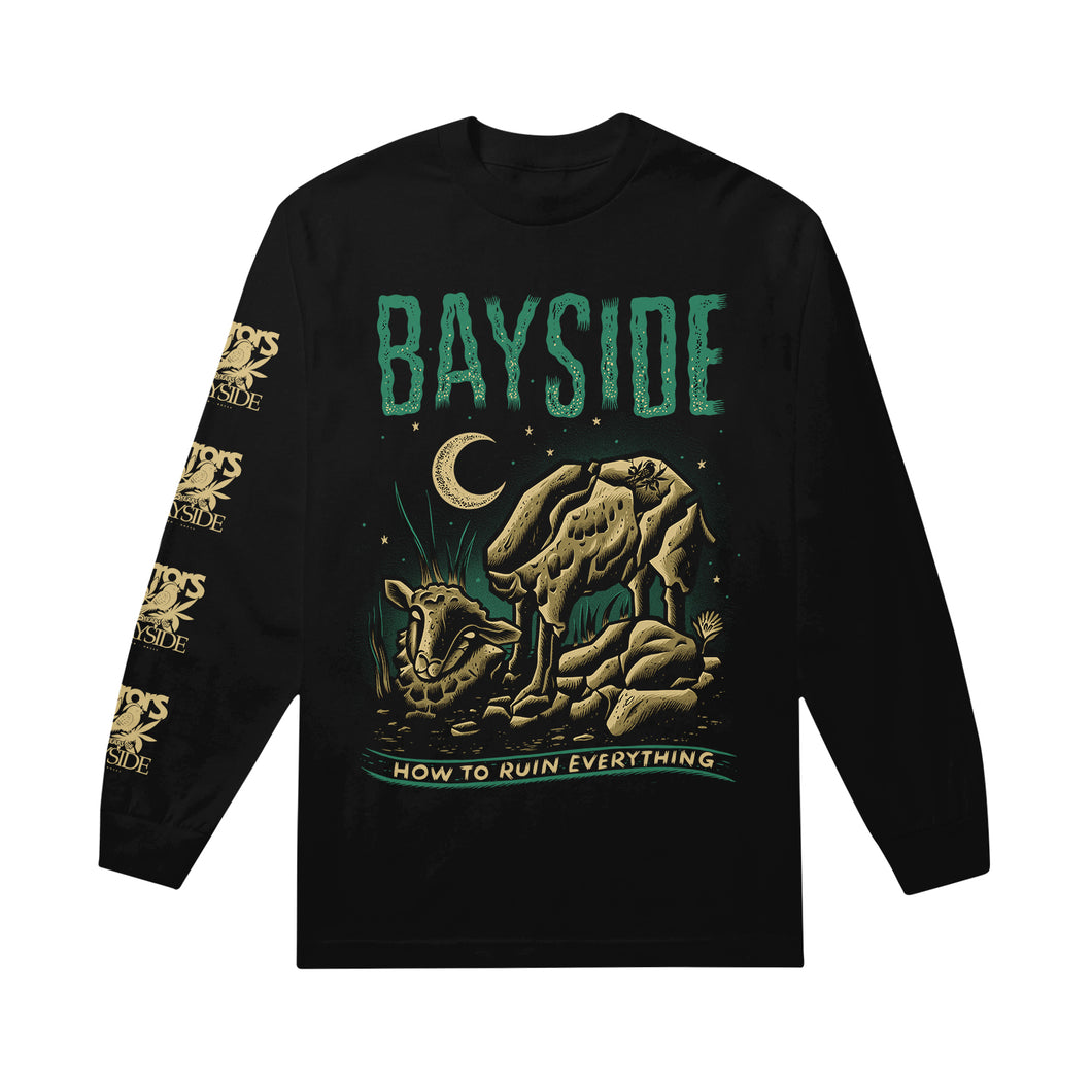 A black Bayside Gildan Hammer long sleeve shirt featuring green and tan cow skeleton, rocks, crescent moon artwork, “BAYSIDE” and “HOW TO RUIN EVERYTHING” text on front, plus repeating “BAYSIDE” logos down the left sleeve.