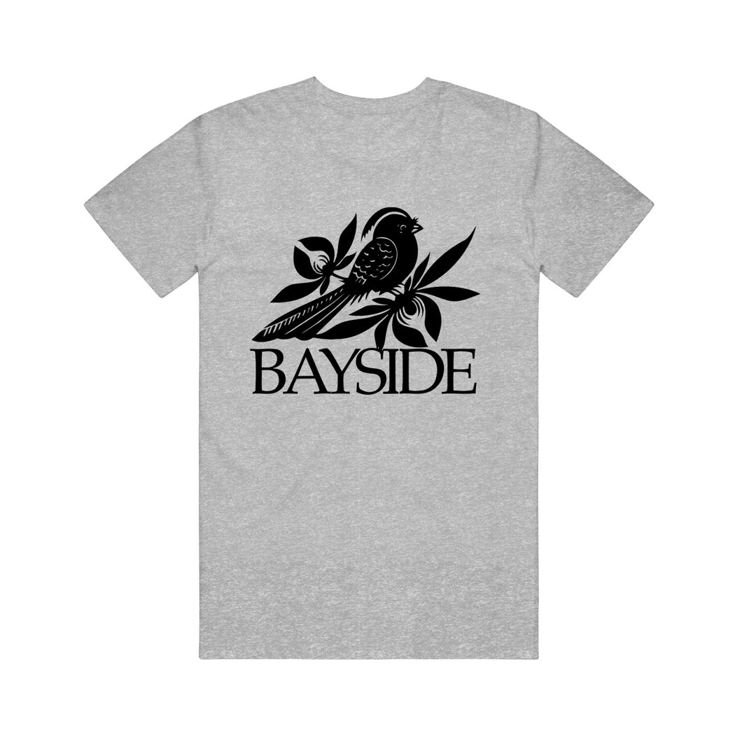 image of an athletic heather grey tee shirt on a white background. the front of the tee has a full chest print in black of a bird and leaves and says bayside below it.