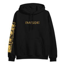 Load image into Gallery viewer, image of the front of a black pullover hoodie on a white background. front of hoodie says bayside across the chest and has a left sleeve print. 