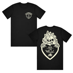 image of the front and back of a black tee shirt on a white background. front of tee is on the left and has a small right chest print of a heart and says bayside at the top. back of the tee is on the right and has a burning skeleton holding a heart that says go to hell