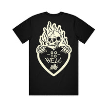 Load image into Gallery viewer, image of the back of a black tee shirt on a white background. tee has a burning skeleton holding a heart that says go to hell