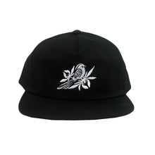 Load image into Gallery viewer, image of a black snapback on a white background. hat has white embroidery of a bird with leaves