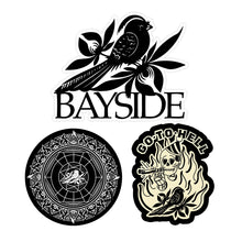 Load image into Gallery viewer, image of three stickers on a white background. top sticker is a bird and says bayside. left sticker is a circle with a mandella and a bird design. the right sticker says go to hell and has a skeleton smoking a joint and the bird on it.