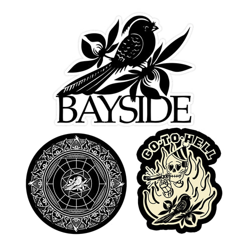 image of three stickers on a white background. top sticker is a bird and says bayside. left sticker is a circle with a mandella and a bird design. the right sticker says go to hell and has a skeleton smoking a joint and the bird on it.