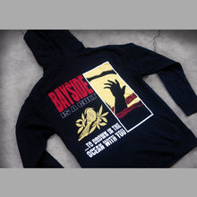 Load image into Gallery viewer, image of the back of a black pullover hoodie on a concrete background. hoodie has a full print of a hand coming out of water, bayside, a bird and the words to drown in the ocean with you.