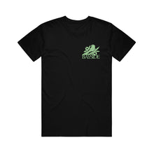 Load image into Gallery viewer, image of the front of a black tee shirt on a white background. tee has a small chest print on the right in green of a bird and below the bird says bayside.