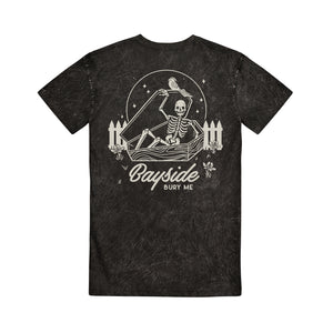image of the back of a black mineral wash tee shirt on a white background. tee has a back print in white of a skeleton opening up a coffin. below that says bayside bury me